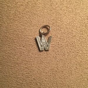 The letter W Pandora charm.